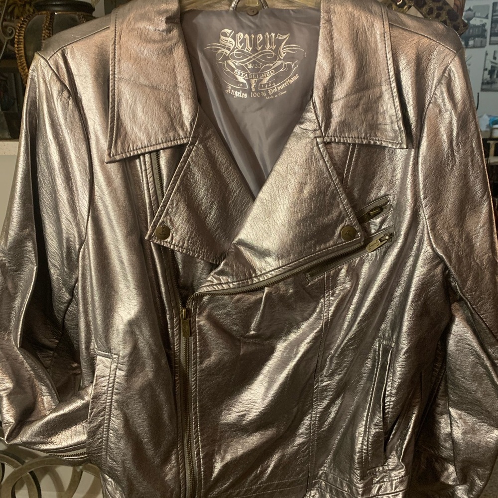 Women silver leather jacket size 18. 80.00